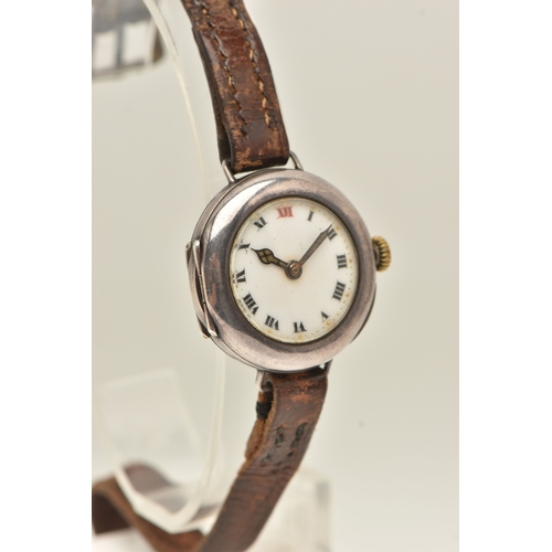 497 - AN EARLY 20TH CENTURY SILVER CASED WRISTWATCH, manual wind, round white Roman numeral dial, polished... 