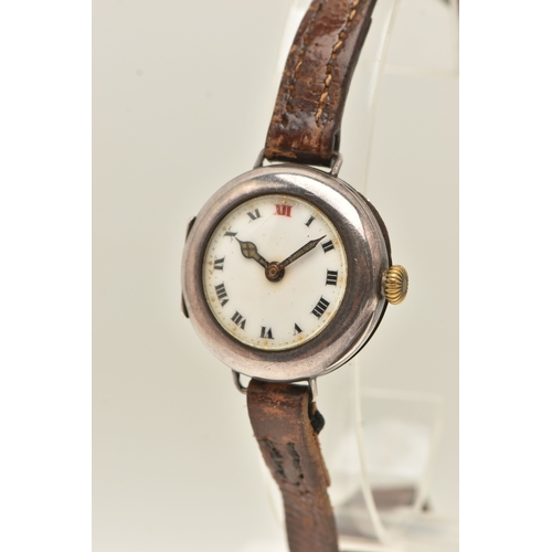 497 - AN EARLY 20TH CENTURY SILVER CASED WRISTWATCH, manual wind, round white Roman numeral dial, polished... 