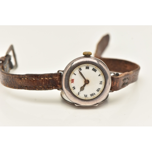 497 - AN EARLY 20TH CENTURY SILVER CASED WRISTWATCH, manual wind, round white Roman numeral dial, polished... 