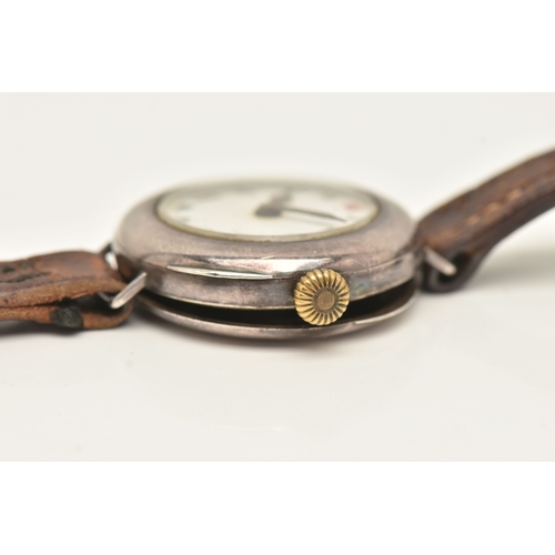 497 - AN EARLY 20TH CENTURY SILVER CASED WRISTWATCH, manual wind, round white Roman numeral dial, polished... 