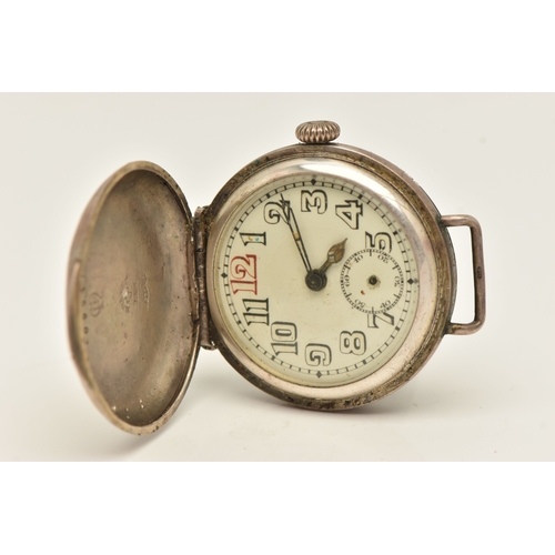 498 - AN EARLY 20TH CENTURY SILVER CASED WATCH HEAD, manual wind, round white Arabic numeral, worn lumines... 