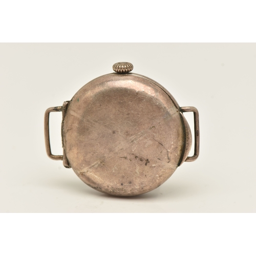 498 - AN EARLY 20TH CENTURY SILVER CASED WATCH HEAD, manual wind, round white Arabic numeral, worn lumines... 