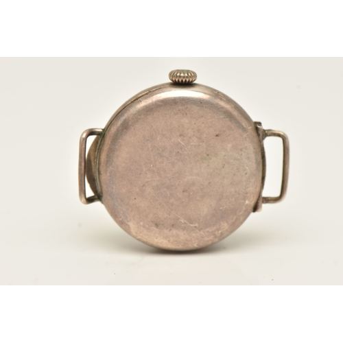 498 - AN EARLY 20TH CENTURY SILVER CASED WATCH HEAD, manual wind, round white Arabic numeral, worn lumines... 