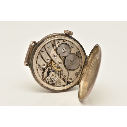 498 - AN EARLY 20TH CENTURY SILVER CASED WATCH HEAD, manual wind, round white Arabic numeral, worn lumines... 
