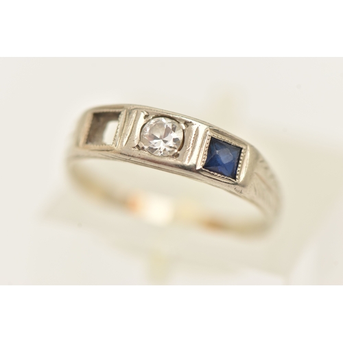 506 - A WHITE METAL GEM SET RING, AF missing one sapphire, set with a central small round brilliant cut di... 