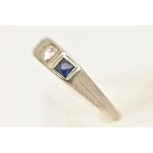 506 - A WHITE METAL GEM SET RING, AF missing one sapphire, set with a central small round brilliant cut di... 
