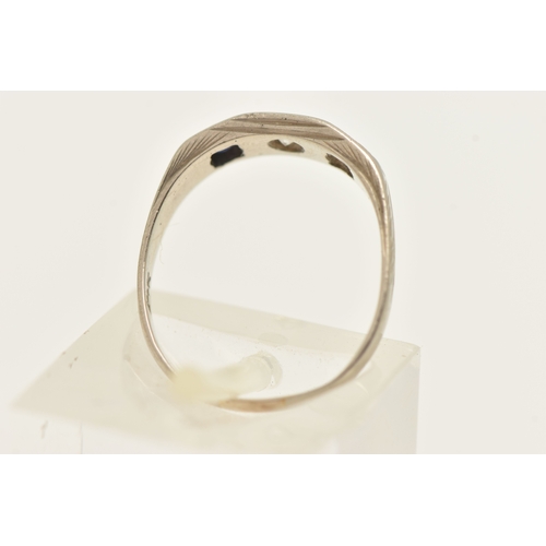 506 - A WHITE METAL GEM SET RING, AF missing one sapphire, set with a central small round brilliant cut di... 