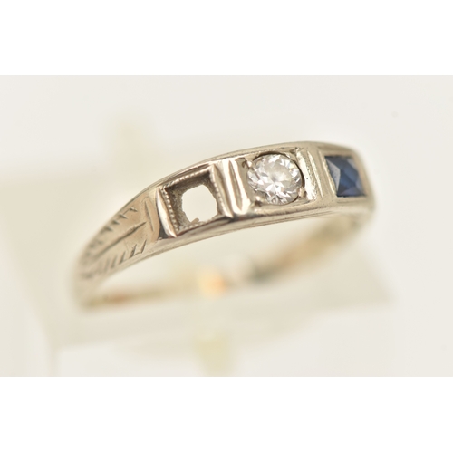 506 - A WHITE METAL GEM SET RING, AF missing one sapphire, set with a central small round brilliant cut di... 