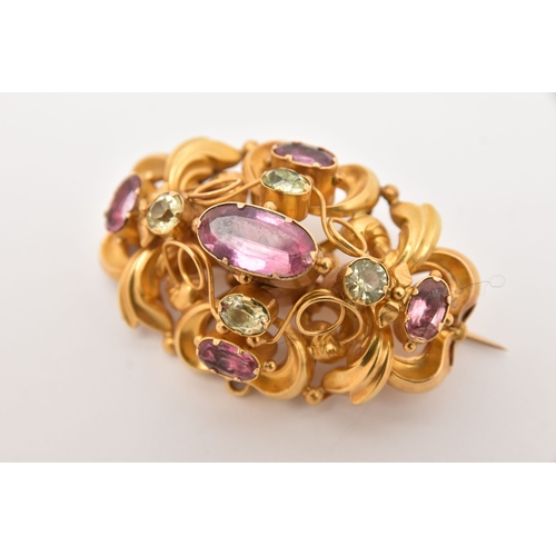 512 - TWO LATE 19TH CENTURY YELLOW METAL GEM SET BROOCHES, the first set with three light blue stones asse... 