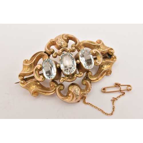 512 - TWO LATE 19TH CENTURY YELLOW METAL GEM SET BROOCHES, the first set with three light blue stones asse... 