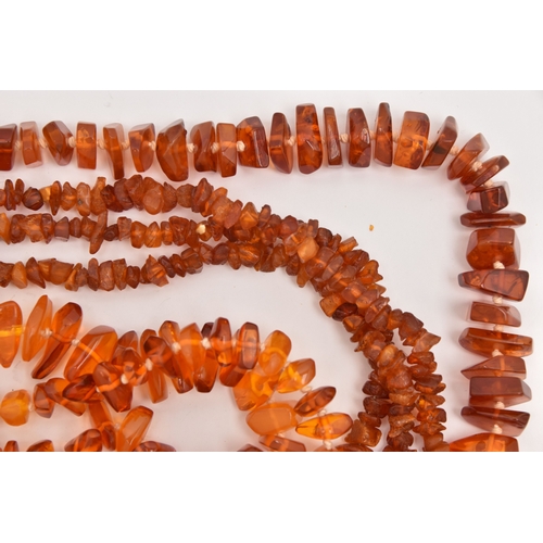 513 - THREE COPAL AMBER NECKLACES, lengths 316mm, 1610mm and 700mm, approximate gross weight 224.5 grams