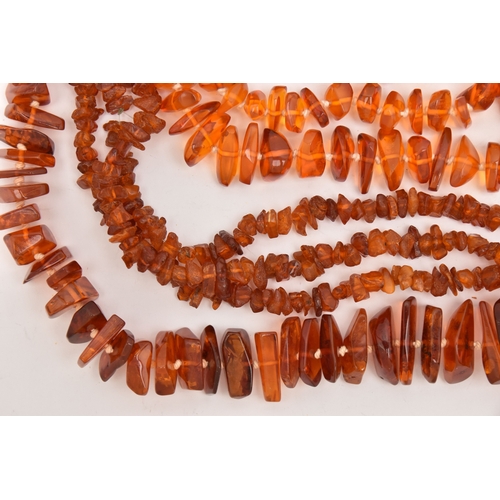 513 - THREE COPAL AMBER NECKLACES, lengths 316mm, 1610mm and 700mm, approximate gross weight 224.5 grams