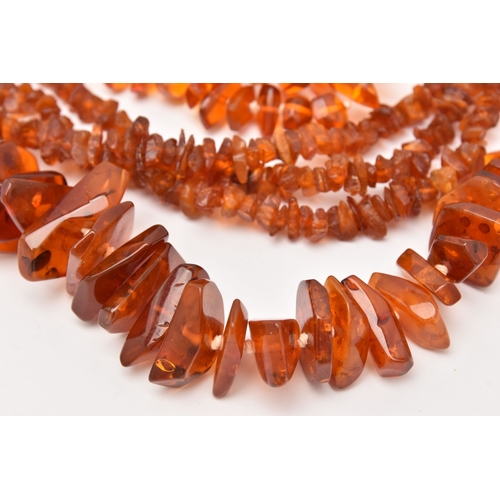 513 - THREE COPAL AMBER NECKLACES, lengths 316mm, 1610mm and 700mm, approximate gross weight 224.5 grams