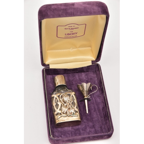 516 - A SILVER AND GLASS SCENT BOTTLE WITH FUNNEL 'FOR LIBERTY', small glass bottle with silver floral des... 