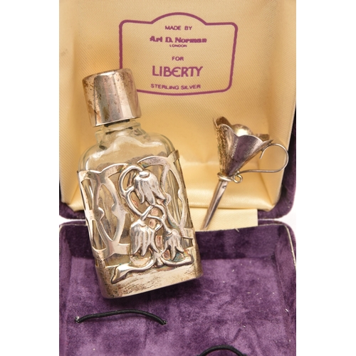 516 - A SILVER AND GLASS SCENT BOTTLE WITH FUNNEL 'FOR LIBERTY', small glass bottle with silver floral des... 