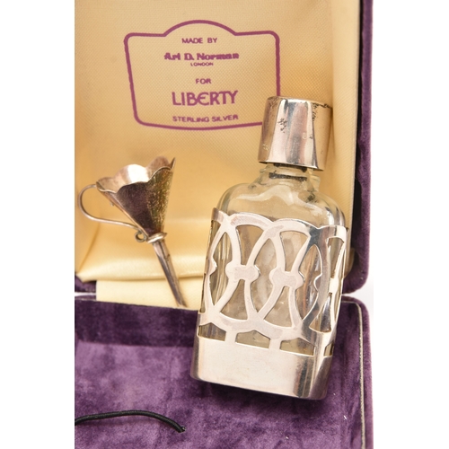 516 - A SILVER AND GLASS SCENT BOTTLE WITH FUNNEL 'FOR LIBERTY', small glass bottle with silver floral des... 