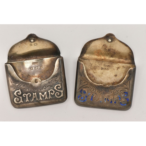 517 - TWO SILVER NOVELTY STAMP HOLDERS, both in the form of an envelope, one with very worn blue enamel de... 