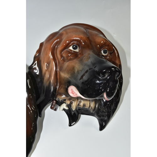 799 - TWO LARGE BESWICK DOG WALL PLAQUES, comprising two plaques of  setters heads, model no. 668, heights... 