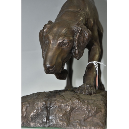 808 - A BRONZED COMPOSITE SCULPTURE OF A GUN DOG, in the style of Georges Gardet, bearing in mould signatu... 