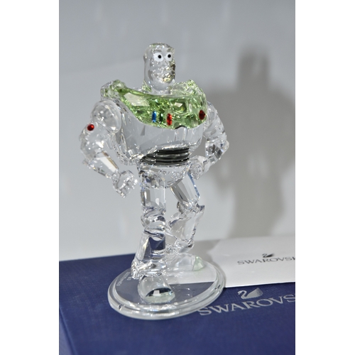 810 - A BOXED SWAROVSKI CRYSTAL TOY STORY 'BUZZ LIGHTYEAR' FIGURE, model no 5428551, the character from th... 