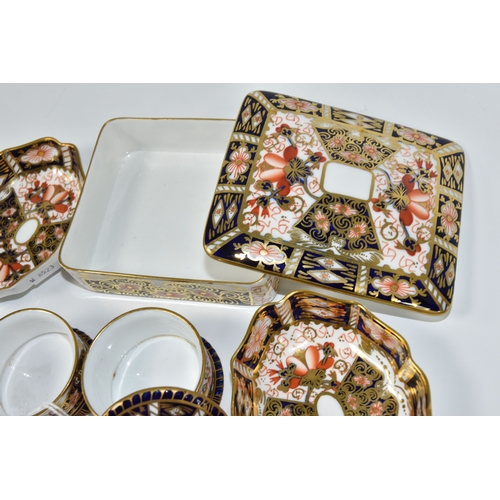 816 - A GROUP OF ROYAL CROWN DERBY IMARI TRINKET BOXES AND DISHES, comprising an Imari 2451 rectangular tr... 