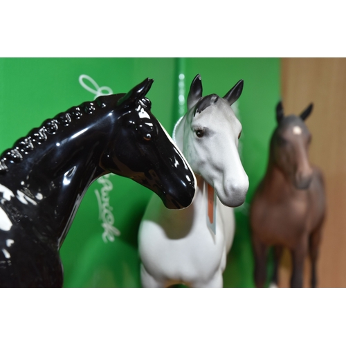 825 - THREE BESWICK HORSE FIGURES, comprising black Hunter, a UKIC exclusive from a special edition of 500... 