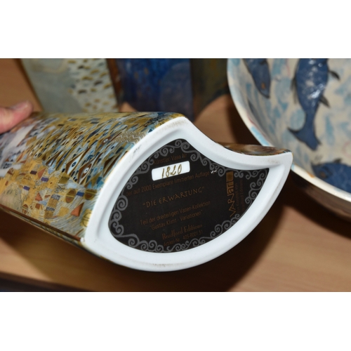 831 - A GROUP OF CERAMICS, comprising three pieces of Poole Pottery: a Galaxy pattern purse vase, height 1... 