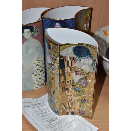 831 - A GROUP OF CERAMICS, comprising three pieces of Poole Pottery: a Galaxy pattern purse vase, height 1... 