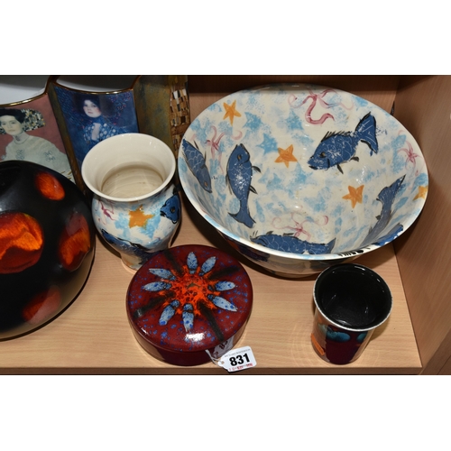 831 - A GROUP OF CERAMICS, comprising three pieces of Poole Pottery: a Galaxy pattern purse vase, height 1... 
