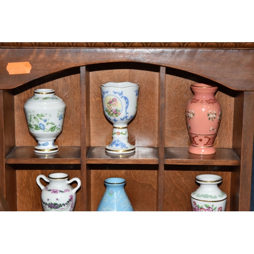 843 - A COLLECTION OF MINIATURE VASES AND PLATES, comprising twenty three miniature plates by various manu... 