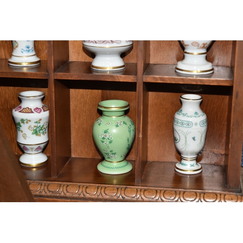 843 - A COLLECTION OF MINIATURE VASES AND PLATES, comprising twenty three miniature plates by various manu... 