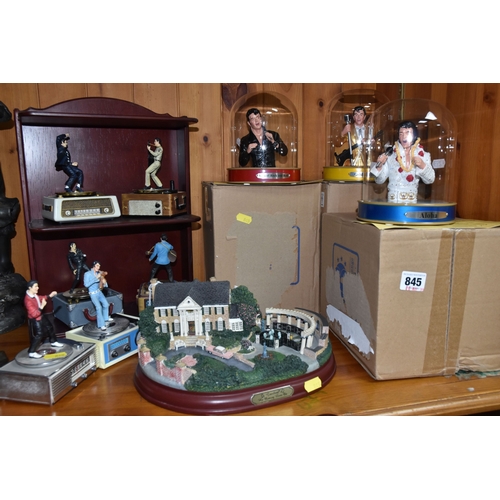 845 - A GROUP OF ELVIS PRESLEY MEMORABILIA to include three Hawthorne Village original Elvis models from t... 