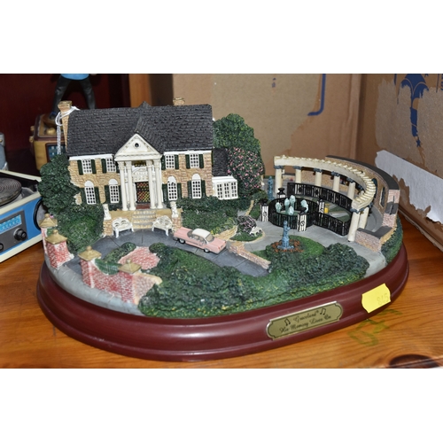 845 - A GROUP OF ELVIS PRESLEY MEMORABILIA to include three Hawthorne Village original Elvis models from t... 