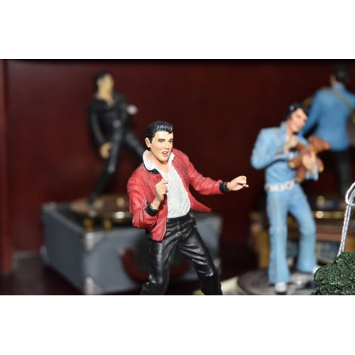 845 - A GROUP OF ELVIS PRESLEY MEMORABILIA to include three Hawthorne Village original Elvis models from t... 