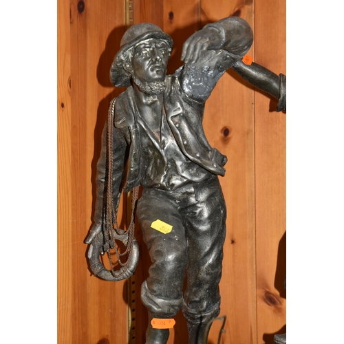846 - A SMALL GROUP OF DECORATIVE BRONZE EFFECT FIGURINES to include an impressive spelter figural pair of... 