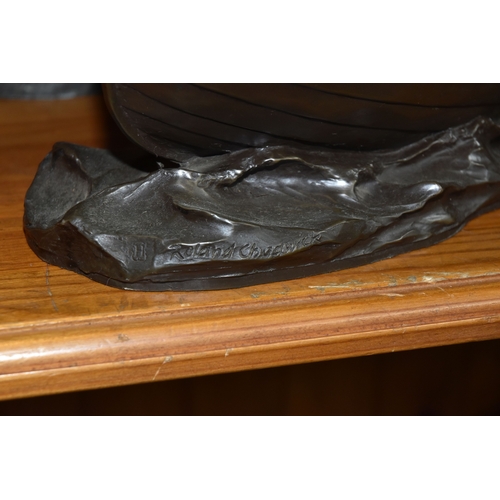 846 - A SMALL GROUP OF DECORATIVE BRONZE EFFECT FIGURINES to include an impressive spelter figural pair of... 