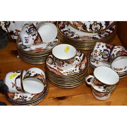 847 - A SMALL ROYAL CROWN DERBY DINNER SET PATTERN NUMBER 4464,  consisting of eight dinner plates (one la... 