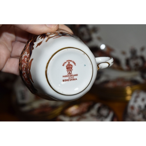 847 - A SMALL ROYAL CROWN DERBY DINNER SET PATTERN NUMBER 4464,  consisting of eight dinner plates (one la... 