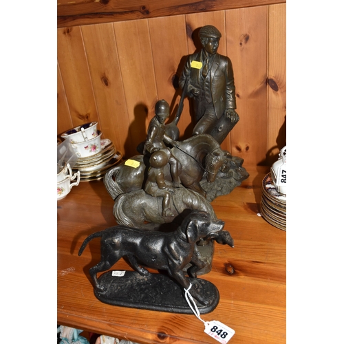 848 - A GROUP OF THREE BRONZED FIGURINES to include a bronzed resin hunter and his gun dog approximately 3... 