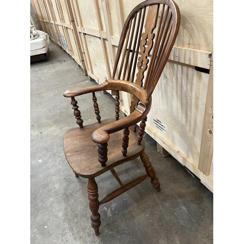 11 - A 19TH CENTURY YEW WOOD AND ELM WINDSOR ARMCHAIR, the hoop back with spindle and pierced splat, on t... 