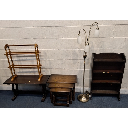 310 - A SELECTION OF OCCASIONAL FURNITURE, to include an oak coffee table, a nest of three tables, a towel... 