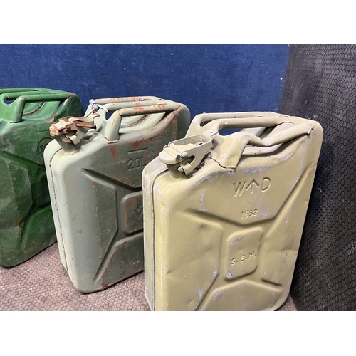 53 - FIVE TWENTY LITRE 'JERRY' CANS including two stamped WD. 1952 (5) Condition Report: rusty, dented an... 