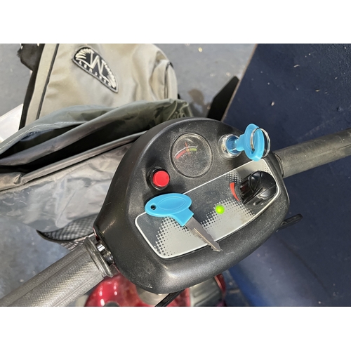58 - AN INVACARE LYNX MOBILITY SCOOTER with two keys, power cable, front basket and various fabric bags  ... 