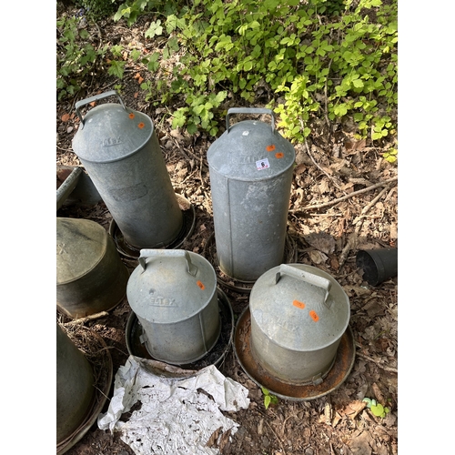 6 - A COLLECTION OF GALVANISED FEED HOPPERS AND A TROUGH, including Eltex hoppers, the tallest height 56... 