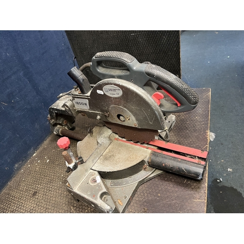 82 - THREE 110 VOLT ROTARY HAMMER DRILLS AND A 240 VOLT PERFORMANCE POWER COMPOUND MITRE SAW comprising a... 