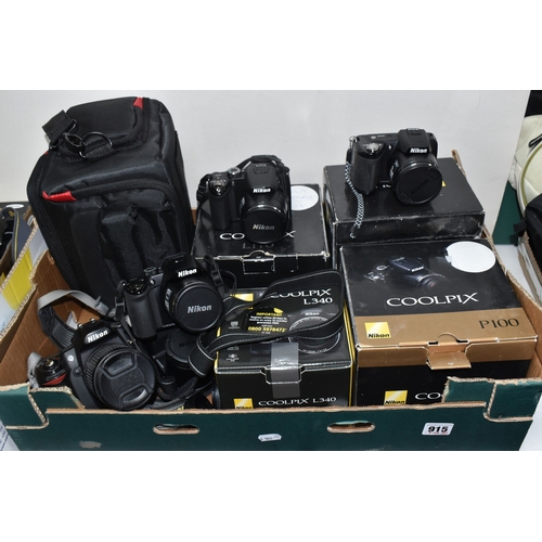 A BOX OF NIKON DIGITAL CAMERAS, comprising a D80 camera body fitted ...