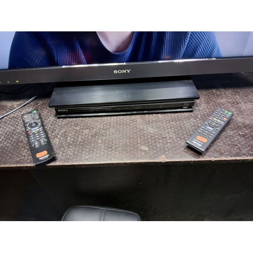 70 - A SONY KDL 40EX503 40in TV with remote and a Sony Blu-ray player with remote and a Philips DVD playe... 