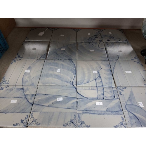 SIXTEEN TILES DEPICTING A SEATED CAT in a blue colourway, tiles stamped ...