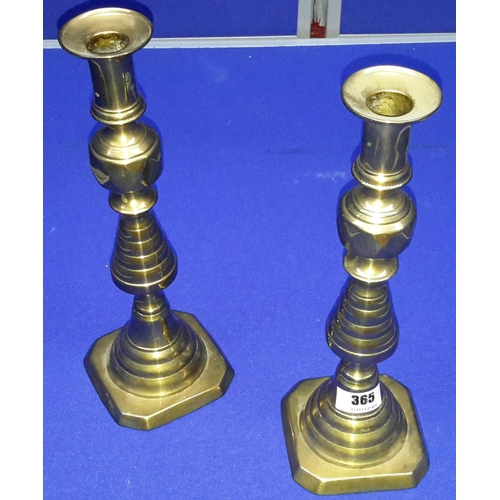 365 - Pair of Victorian brass candlesticks with push bottoms.