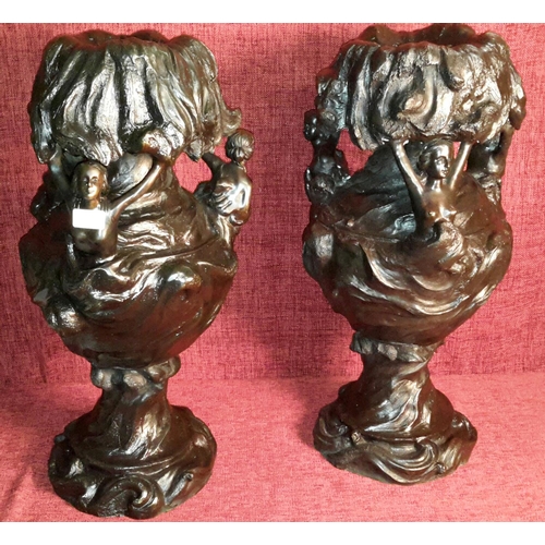 101 - Large pair of bronze vases with 3 lady figures supporting upper half of the vases. 63cm tall